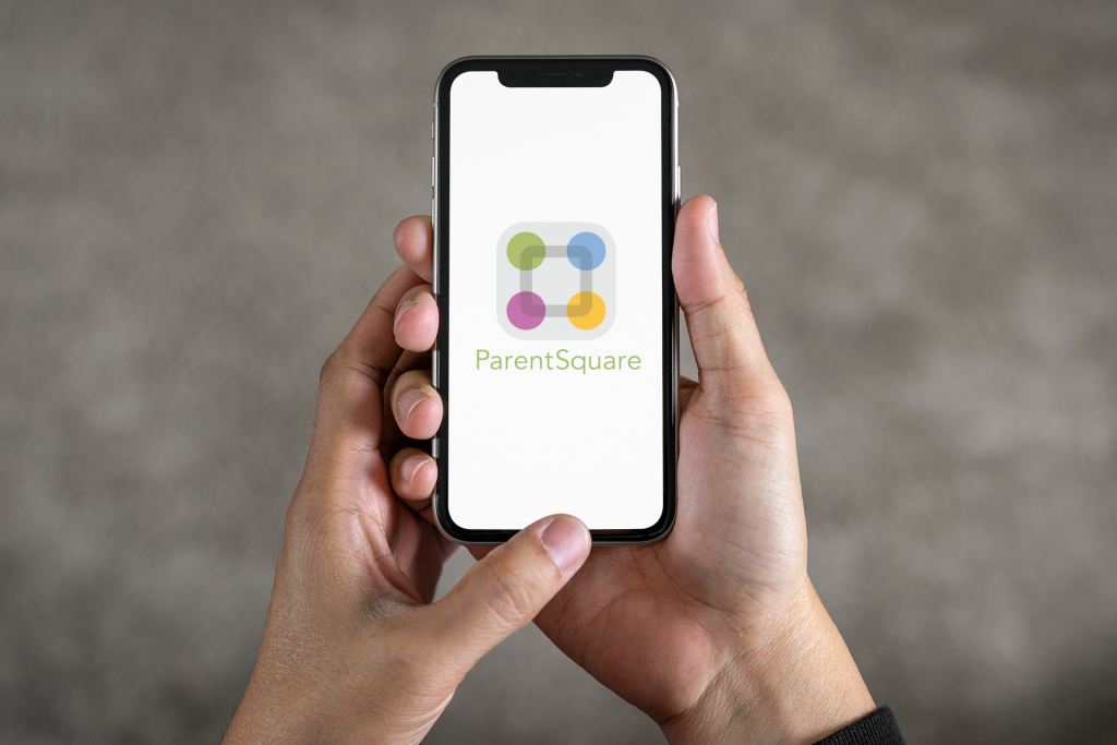 parentSquare holding phone